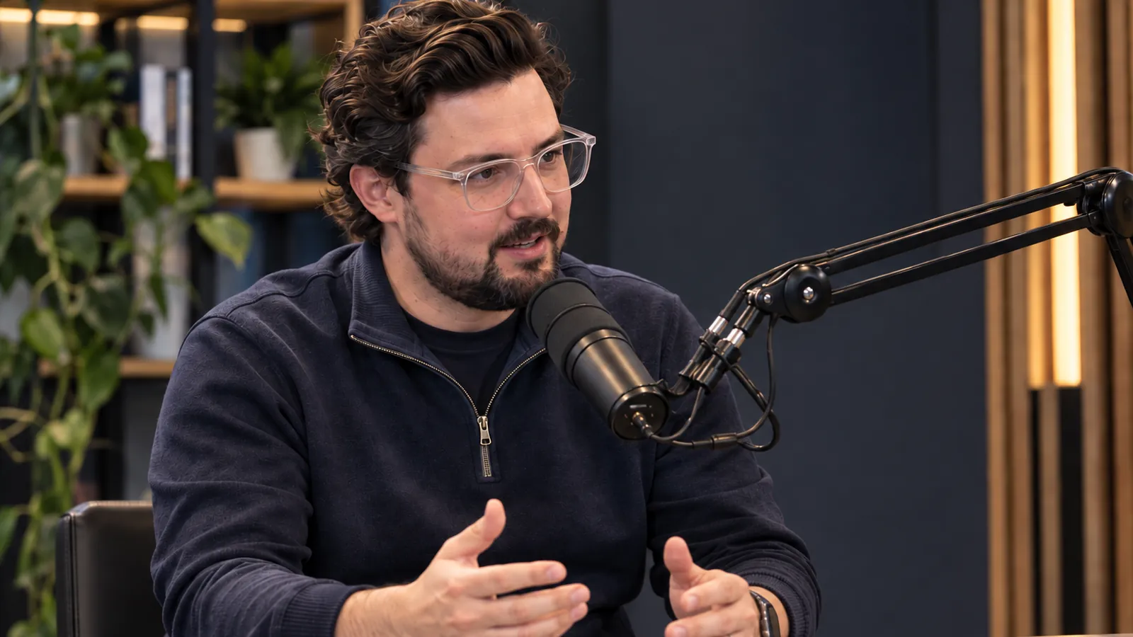 Joshua Baldwin recording a podcast interview in a studio