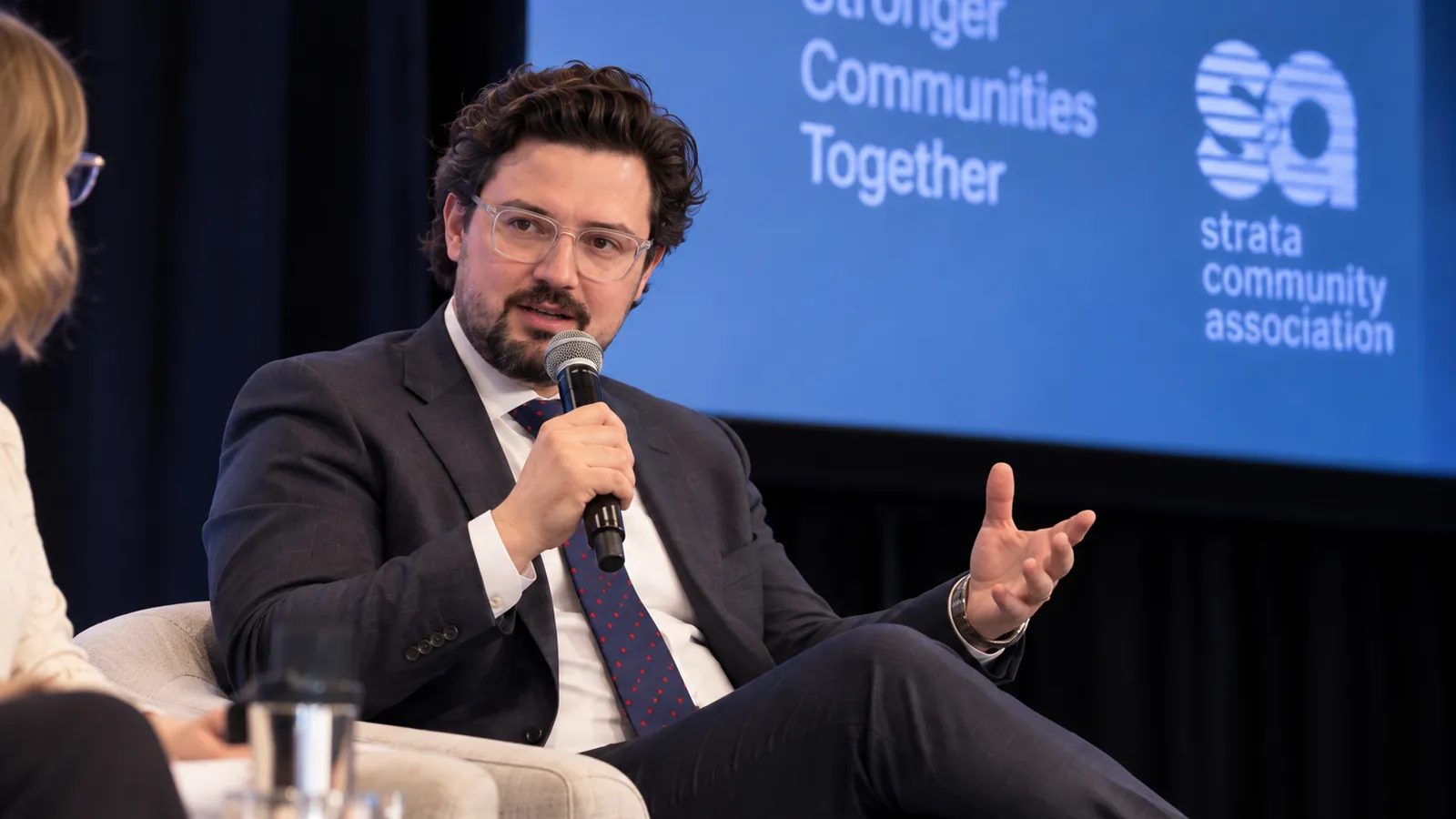 Joshua Baldwin speaking on a conference panel